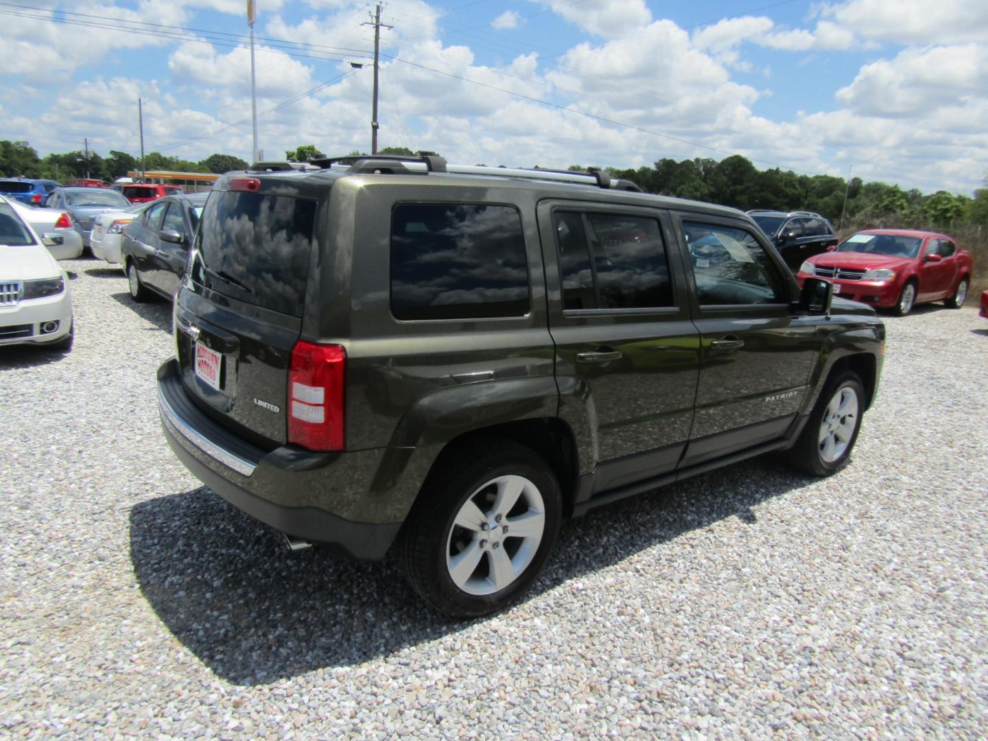 2015 Green /Tan Jeep Patriot (1C4NJPCB2FD) with an 4 CYL engine, Automatic transmission, located at 15016 S Hwy 231, Midland City, AL, 36350, (334) 983-3001, 31.306210, -85.495277 - Photo#7